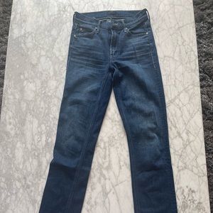 Mother bootcut denim with frayed bottoms and slit